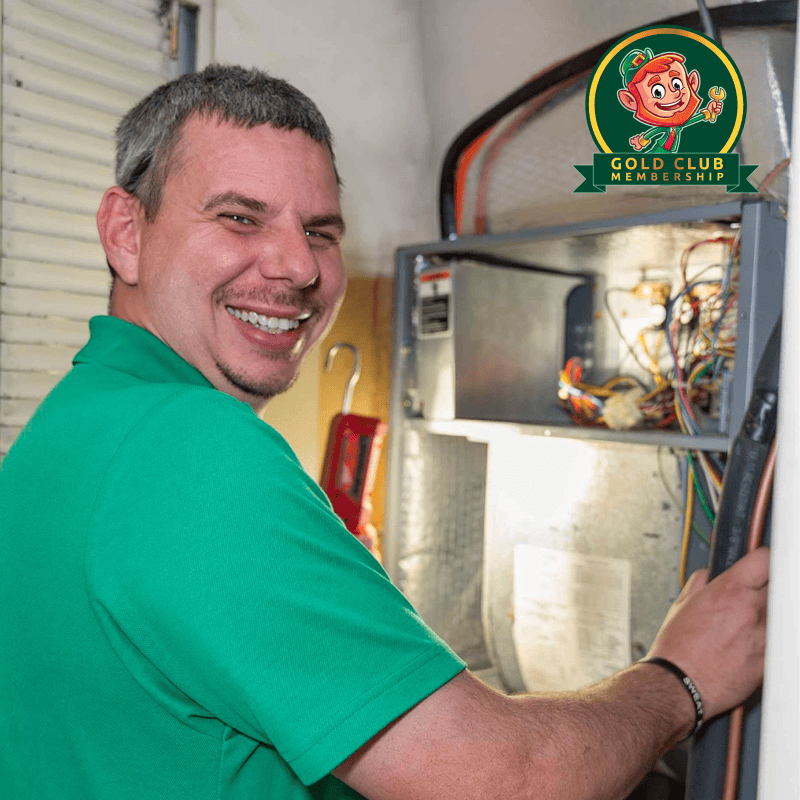HVAC maintenance technician replacing a filter